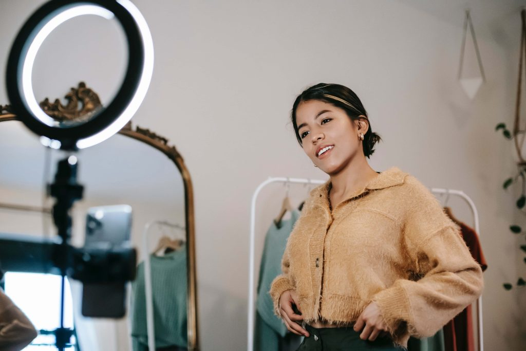 Woman standing in front of a mirror